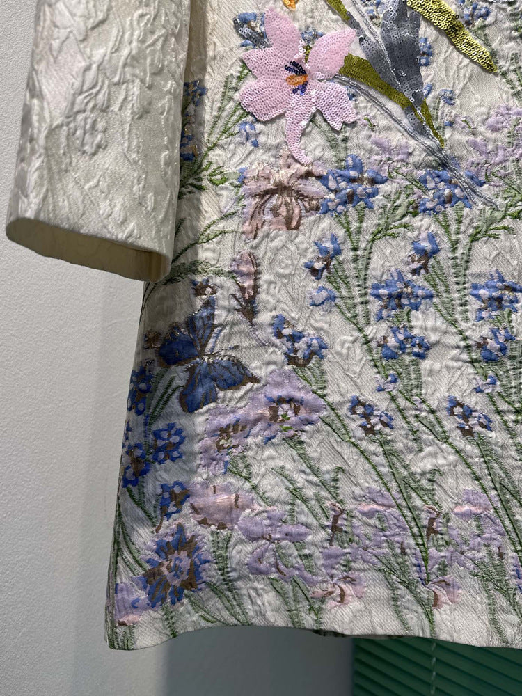 "A Masterpiece of Contemporary Fashion: Elevate Your Collection with This Exquisite Dress"